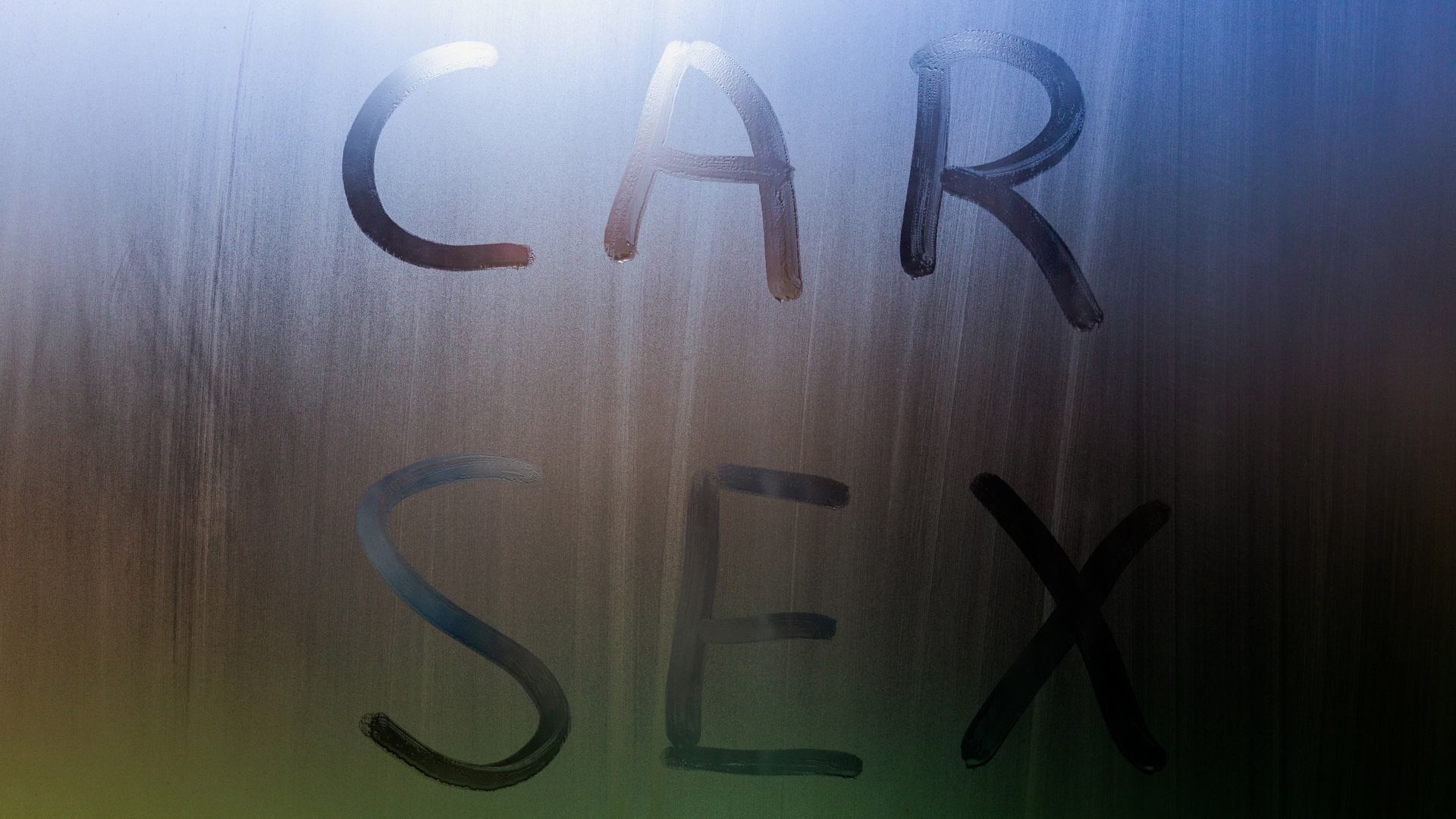Foggy window with the words "car sex" written on it.