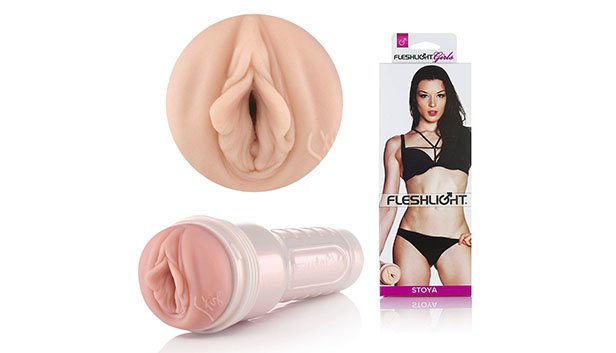 The Stoya Destroya fleshlight against a white background. A close-up of a silicon vagina and the Fleshlight packaging box.