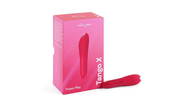 The bullet vibrator we-vibe tango x against a white background. The sex toy is dark pink in color.